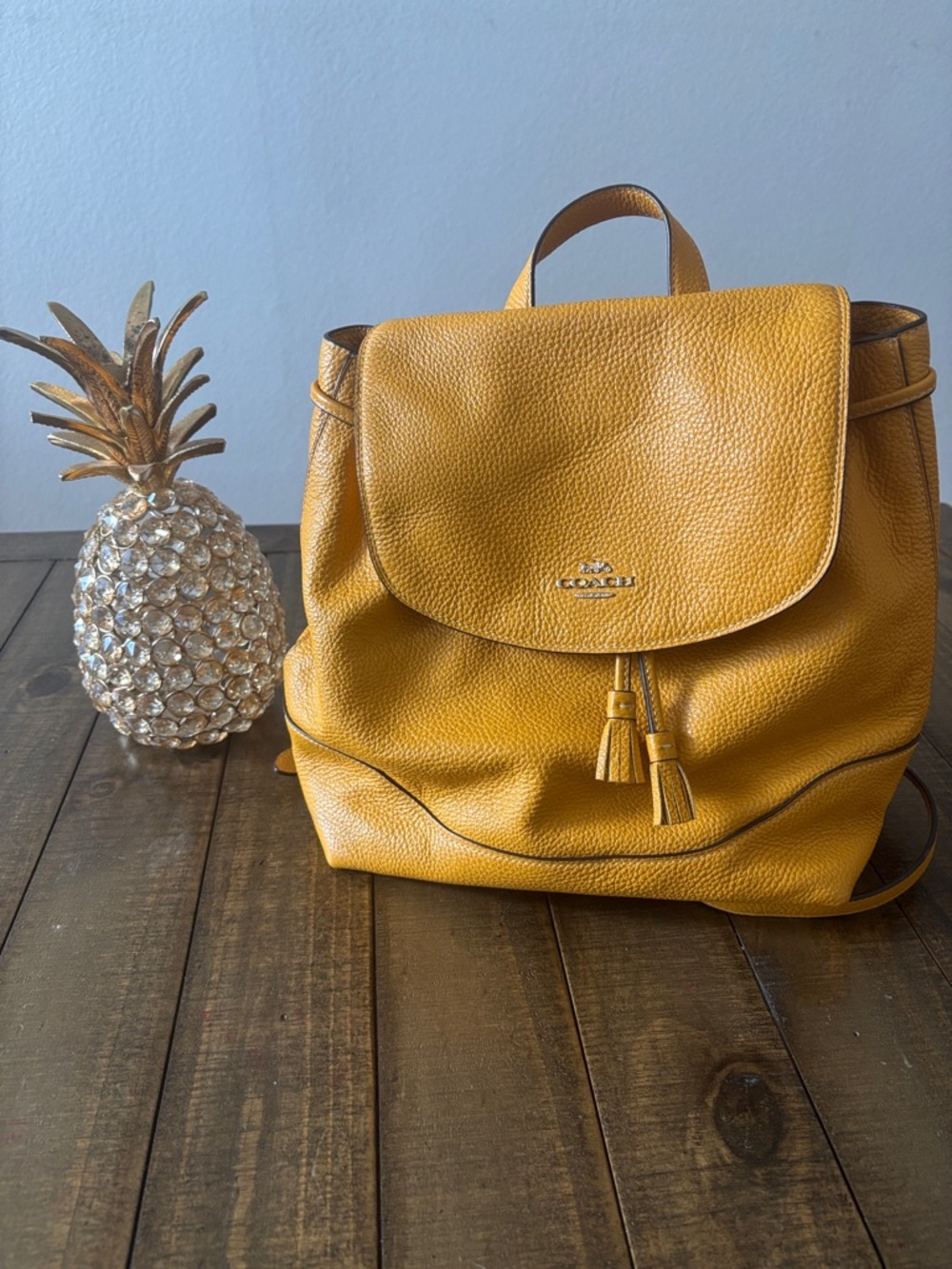 Coach Yellow Pebbled Leather Backpack with Tassel Detail